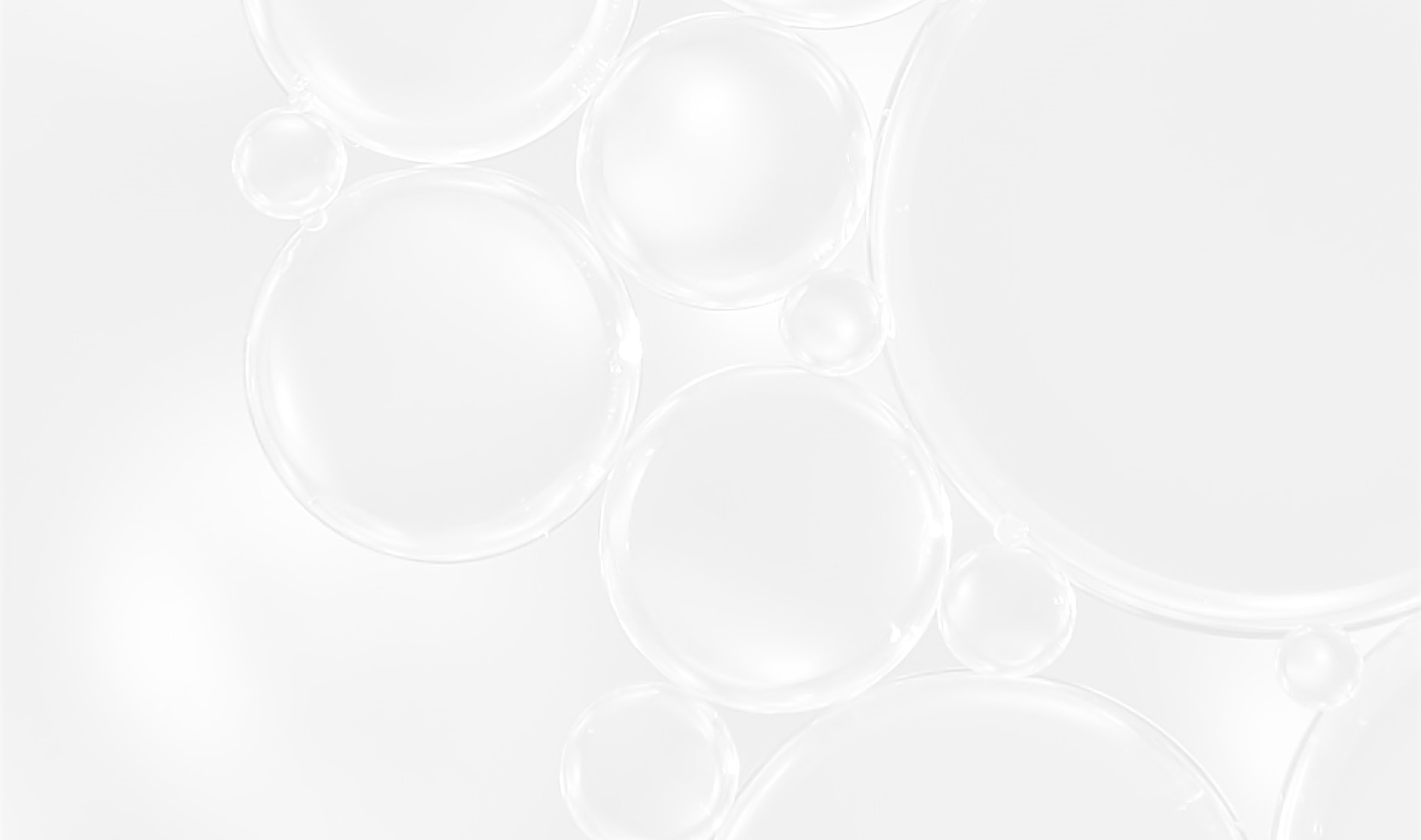 Dark bubbles on a textured background.