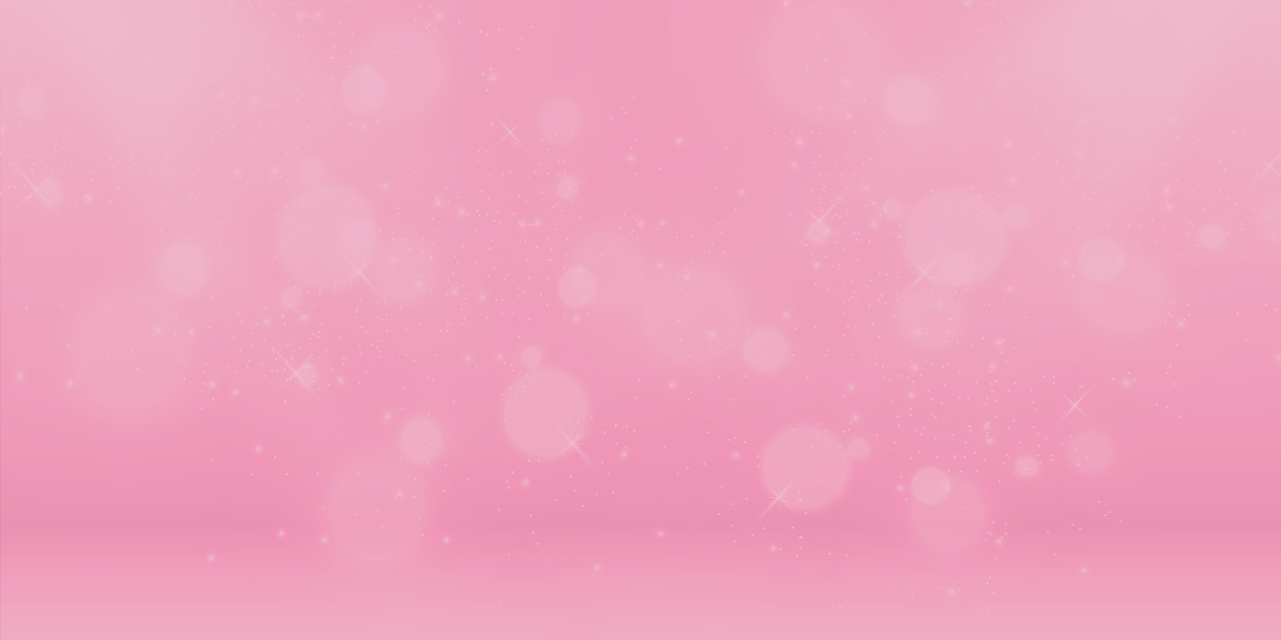 Soft pink background with sparkling bokeh effects.