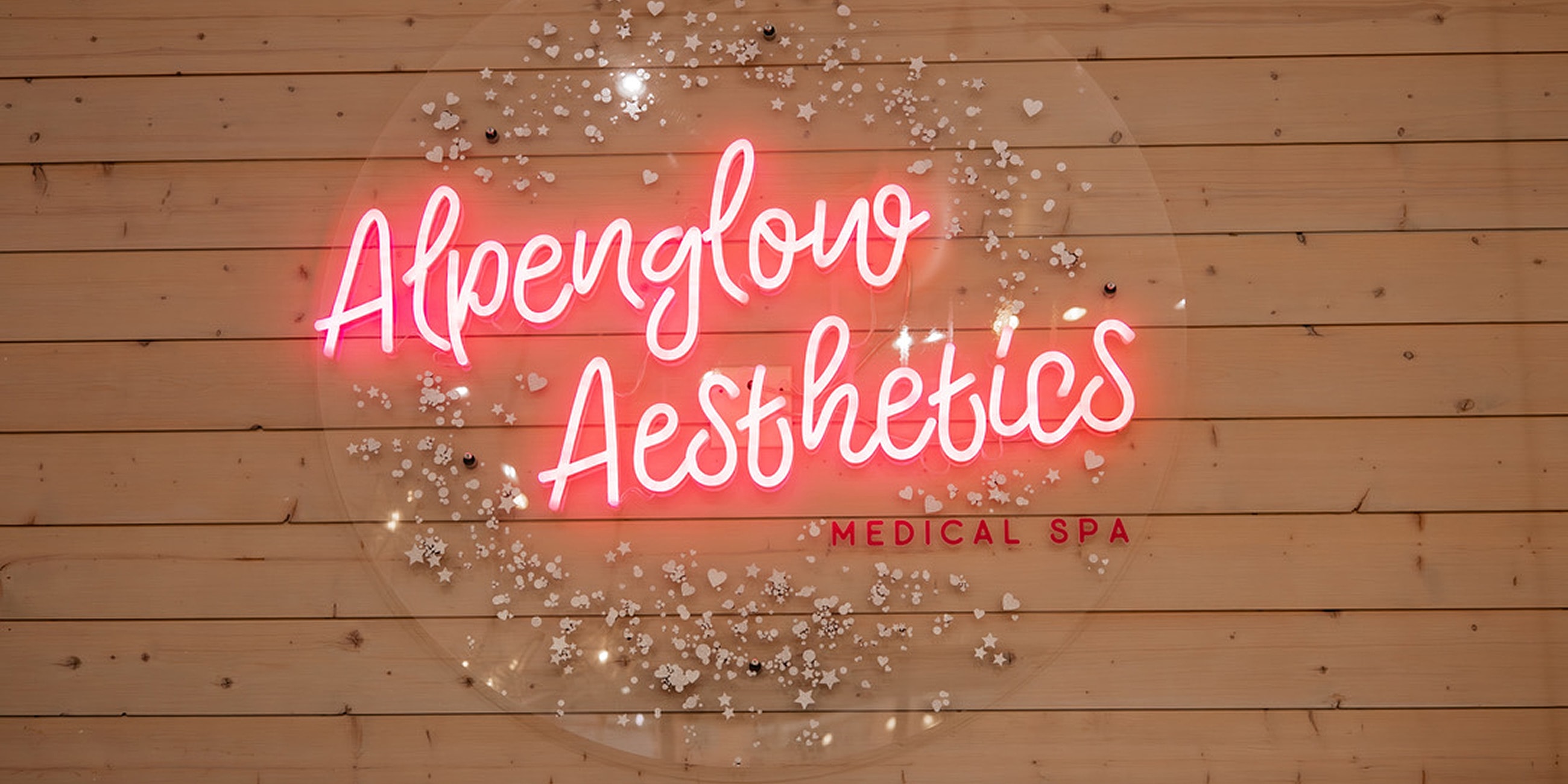 Neon sign for Alpenglow Aesthetics medical spa