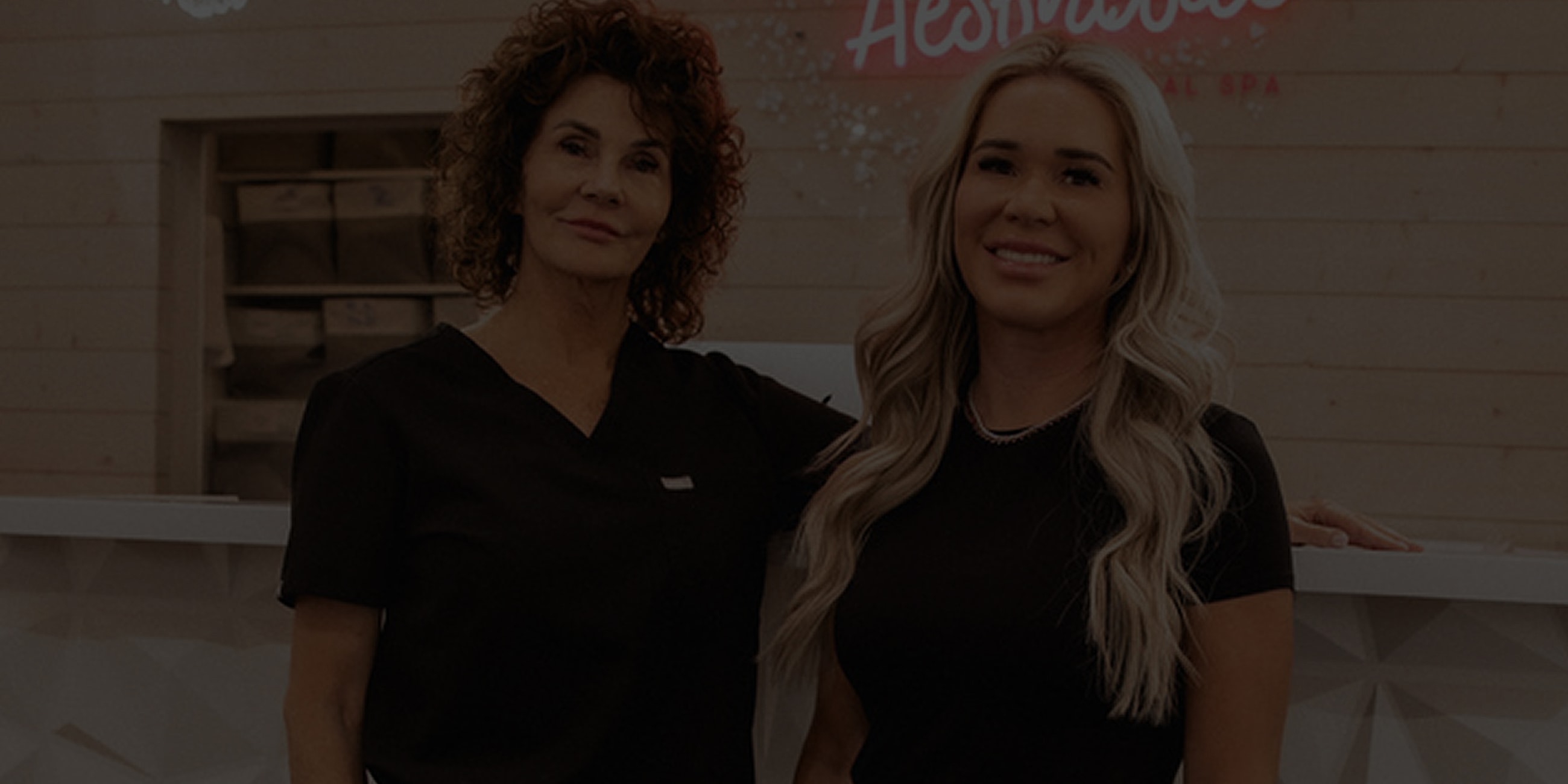 Cosmetics and accessories displayed on a table.