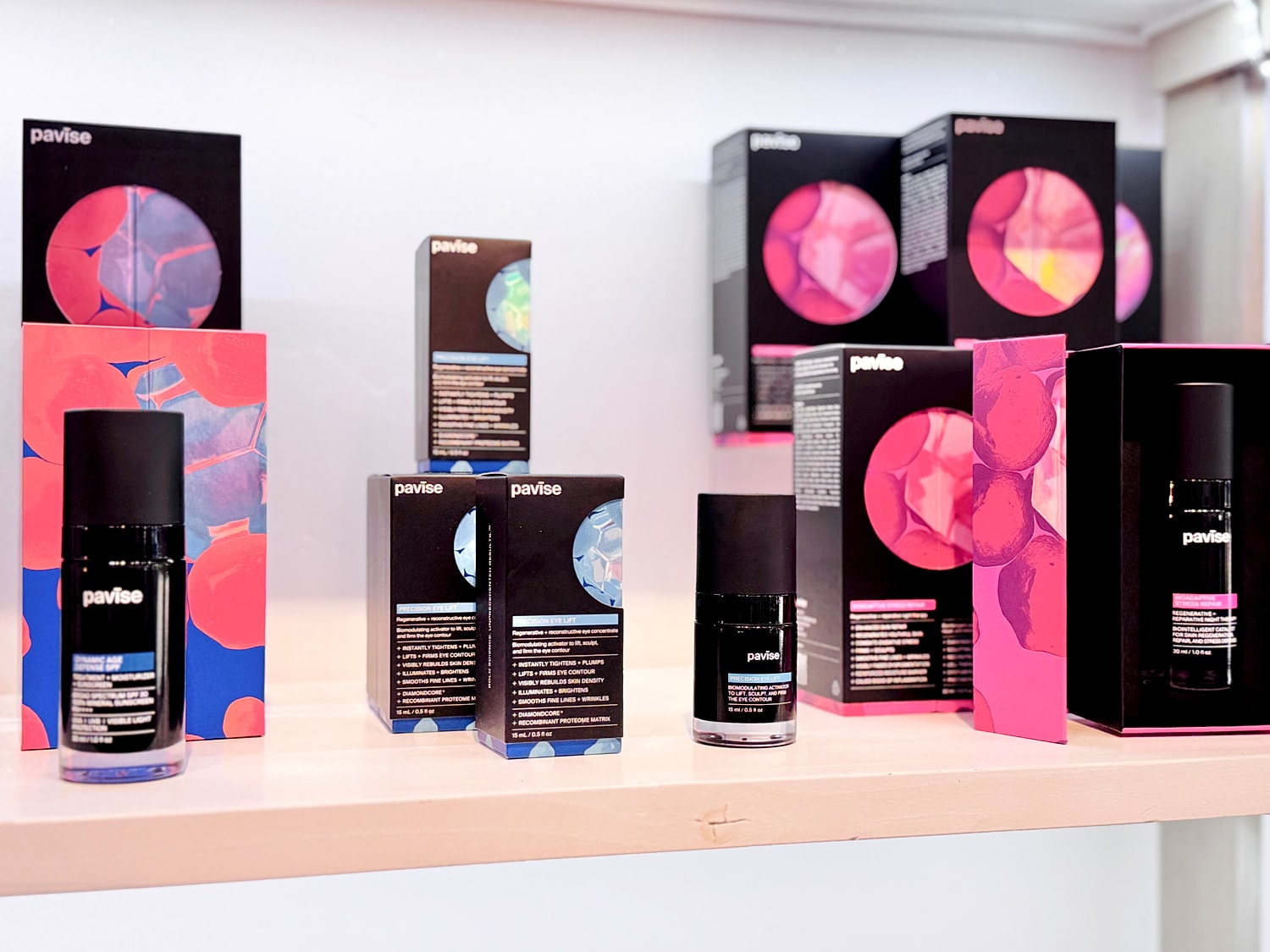 Skincare products displayed on a shelf.