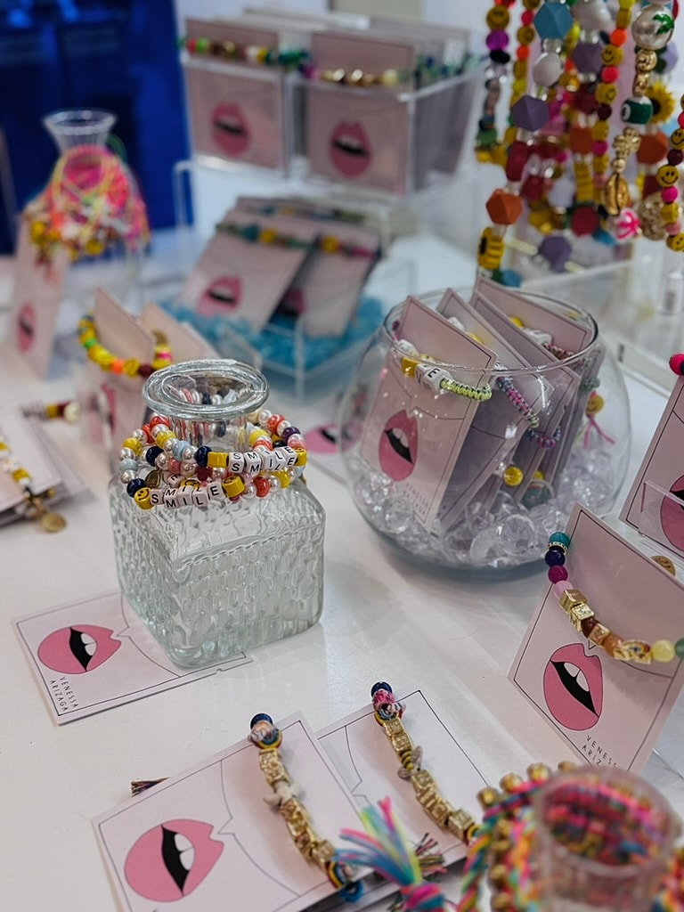 Colorful jewelry displayed on a table.