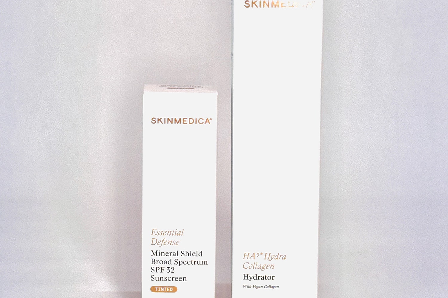 SkinMedica skincare products: sunscreen and hydrator.