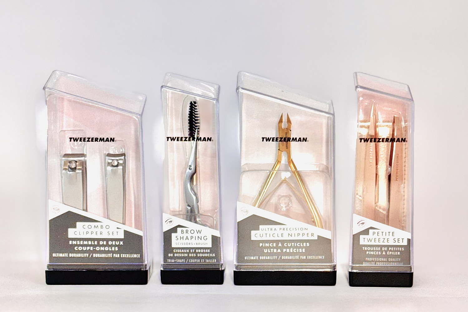 Tweezerman grooming tool sets in packaging