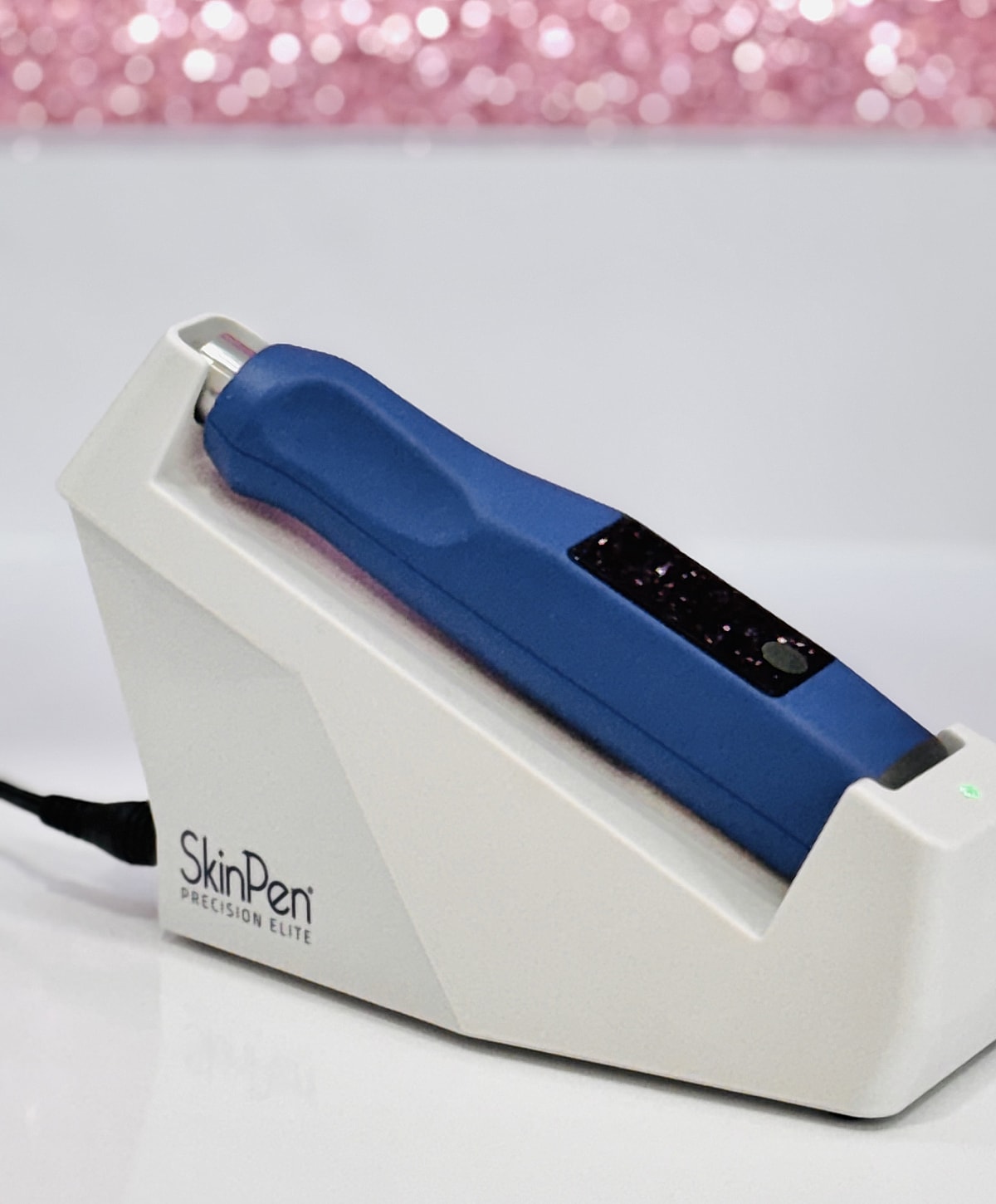 SkinPen device on charging station.