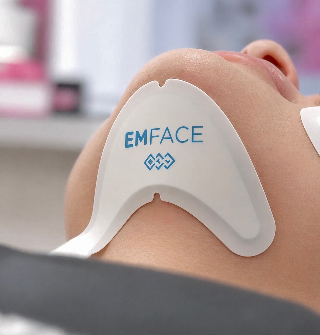 EMFACE treatment device on a person's face.